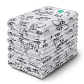 Luciphia paw-print dog blanket offers cozy protection for furniture from fur and claws.