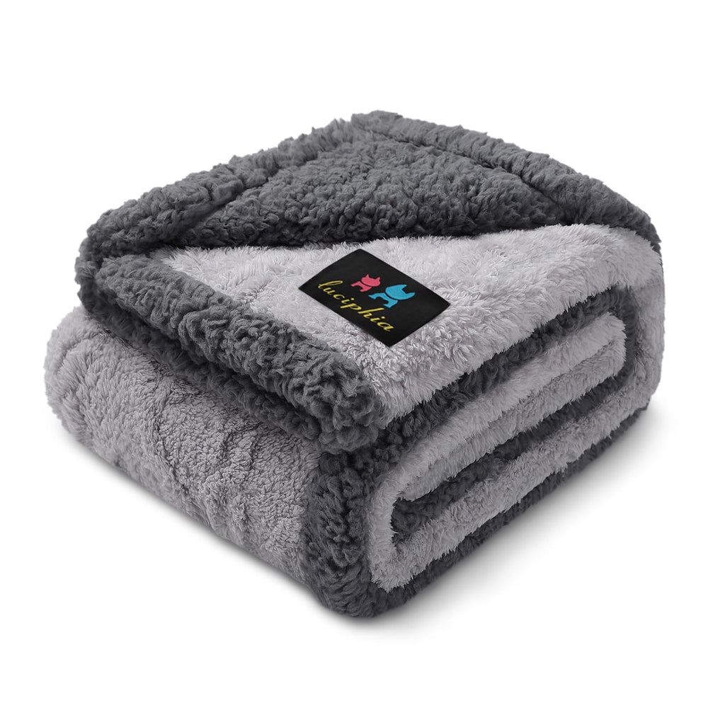 Luciphia waterproof pet blanket front view protecting a sofa from spills