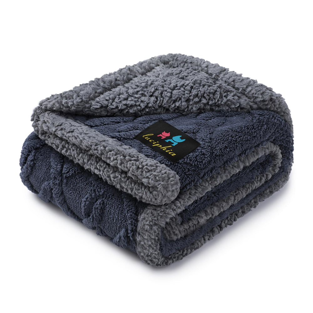 Luciphia waterproof pet blanket on sofa protects upholstery from spills.