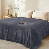 Luciphia waterproof pet blanket on sofa showing triple-layer protection against spills