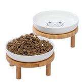 Lusifaco white ceramic bowls on bamboo stand for stable, mess-free feeding at home.