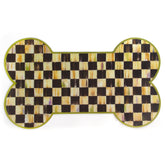 MACKENZIE-CHILDS Pup Placemat bone-shape design keeps bowls in place for mealtime.