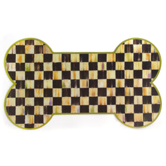 MACKENZIE-CHILDS Pup Placemat bone-shape design keeps bowls in place for mealtime.