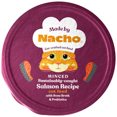 Made by Nacho wet cat food close-up salmon in broth showing savory texture