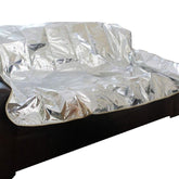 Maikuni Pet Repeller Pad on sofa, silver 72, helps deter pets from lounging and keeps furniture clean.