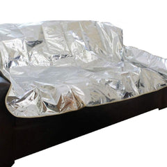 Maikuni Pet Repeller Pad on sofa, silver 72, helps deter pets from lounging and keeps furniture clean.