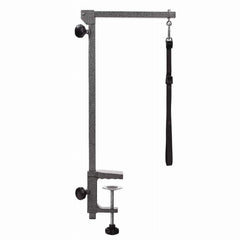 Master Equipment folding grooming arm extends over table by 13.25 inches for reach.