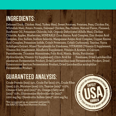 Bag of Merrick duck kibble pouring, omega fatty acids shown for coat health