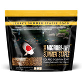 MICROBE-LIFT Summer Staple floating pellets on pond surface for easy feeding