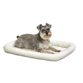 MidWest QuietTime fleece bed inside a 30-inch crate for secure lounging