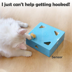 Migipaws Migibox with popping feathers, stimulating hunting instincts in indoor cats.