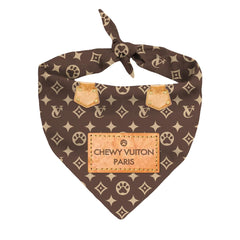 Millionaire Mutt Chewy Vuiton bandana handbag-inspired design adds chic flair for photos.