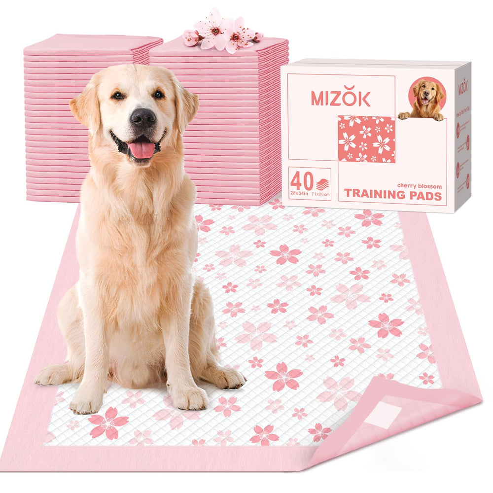 MIZOK dog pee pad 28x34 with pink cherry blossom design for comfortable training sessions.