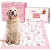 MIZOK dog pee pad with pink cherry blossom design for stylish, mess-free potty training.