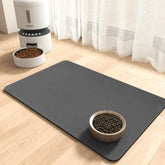 MontVoo absorbent pet feeding mat no-stains keeps spills contained under bowls.