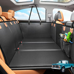 MYJAQI back seat extender in a truck offers extra space for dogs.
