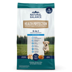 Natural Balance Health Protection puppy kibble closeup showing real chicken protein