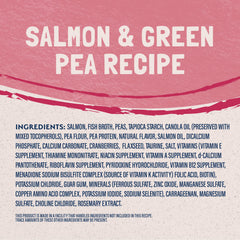 Close-up of salmon morsels in Natural Balance cat food can highlighting single-protein formula.