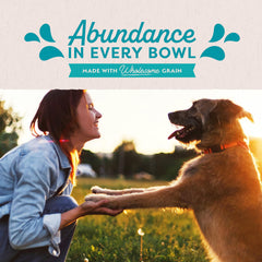Natural Balance Original Ultra wet dog food chicken ingredients close-up—protein-rich chicken and wholesome grains