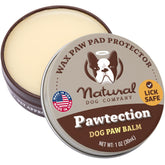 Natural Dog Company Pawtection Balm tin for all-season paw protection on rough surfaces.