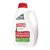 Nature's Miracle Stain and Odor Remover bottle pouring to tackle cat urine stains.