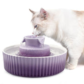 NautyPaws ceramic cat fountain purple body close-up promotes enticing drinking