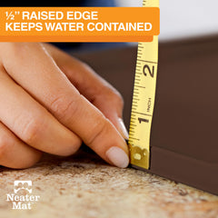 Neater Mat raised edge contains spills around bowls.