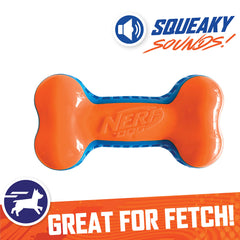 Nerf Dog 7in Squeak Bone in action for fetch training outdoors.