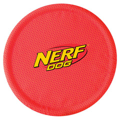 Nerf Dog Nylon Flyer in-flight on beach scene for exciting fetch sessions.