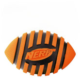 Nerf Dog Spiral Squeak Football in orange for high-visibility fetch.