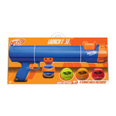 Nerf Dog blaster handle loading a ball for hands-free pickup.