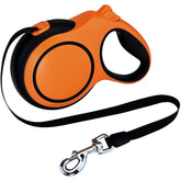 NexLogi 26ft retractable leash extended for open-field exploration with secure control.