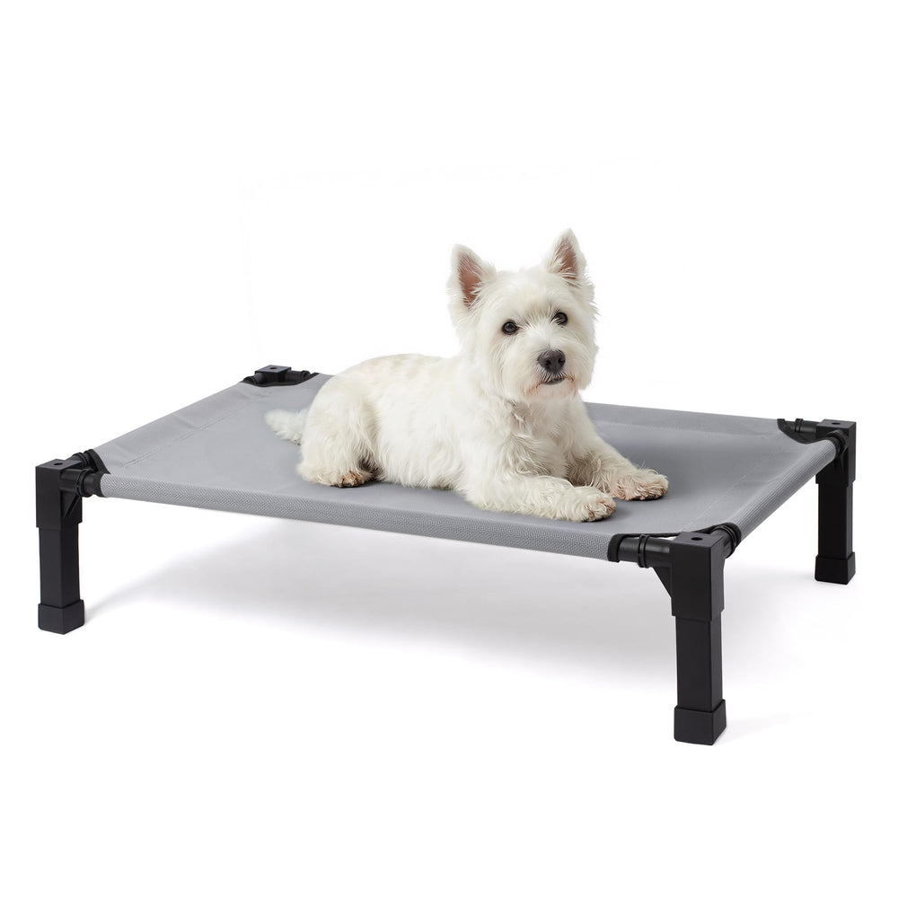 Niubya elevated outdoor dog bed frame provides stable support for outdoor lounging.
