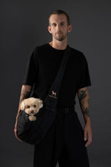 Noah & Paw dog sling with adjustable strap supports comfortable, customizable fits.