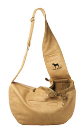 NOAH & PAW dog sling on the shoulder for easy, hands-free small dog carrying.