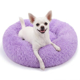 Nononfish calming donut bed in purple with a round silhouette for small pets.