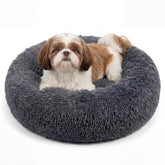 Nononfish calming donut dogs bed offers cozy security for small pets.