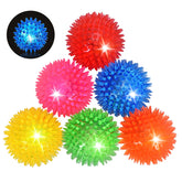 Novkin LED squeaky ball red glows on impact for safe, visible outdoor fetch.