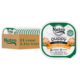 Nutro Puppy chicken bites in gravy tray close-up showing real chicken flavor