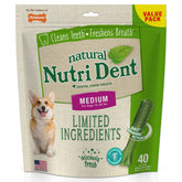 Nylabone Nutri Dent dental treats in packaging highlighting natural ingredients and vet-backed care.