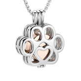 Oinsi pet cremation urn pendant holds ashes or fur for remembrance.