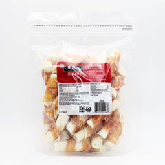 Close-up of Ol' Roy 2.5-inch rawhide roll with dehydrated chicken, promoting healthy chewing.