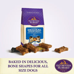 Dog enjoying Old Mother Hubbard Crunchy Classic snacks during playtime.