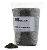 Old Potters Wildlife Black Oil Sunflower Seeds in bag to attract diverse backyard birds.