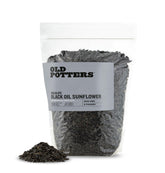 Old Potters Wildlife black oil sunflower seeds in an open bag attract diverse birds.
