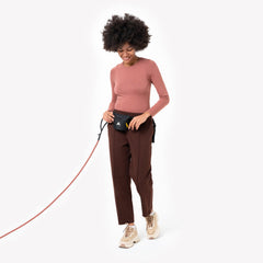 Leash attachment option for OllyDog Goodie Bag during walks.