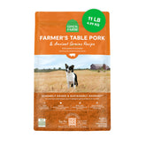 Open Farm ancient grains dog food bag shows protein-rich formula and clean ingredient list.