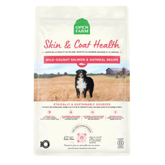 Open Farm Skin & Coat Health dog food bowl with glossy kibble for a healthy coat.