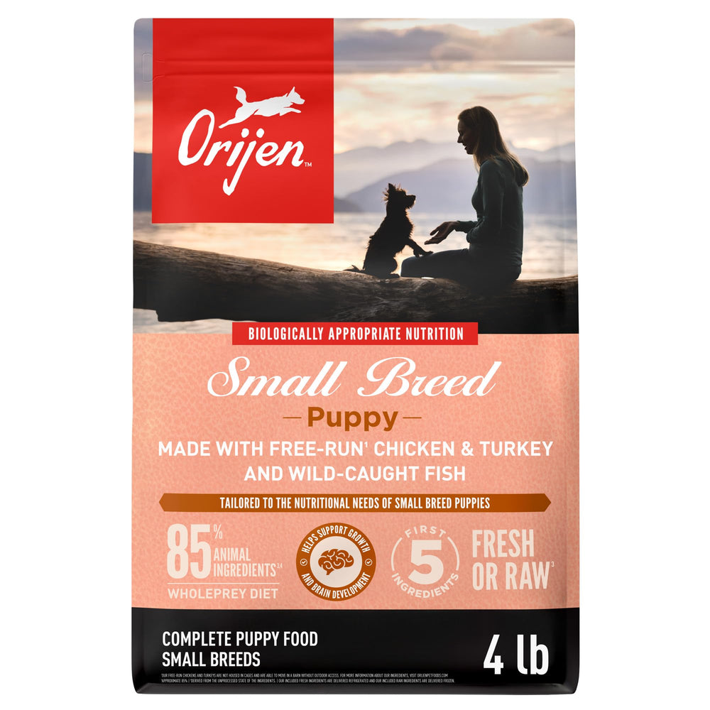 ORIJEN small breed puppy dry food bag close-up highlights premium WholePrey ingredients for growth