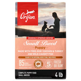 ORIJEN small breed puppy dry food bag close-up highlights premium WholePrey ingredients for growth